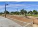 Bocce ball court with benches in a well-maintained park setting at 3829 E Sawtooth Dr, Chandler, AZ 85249