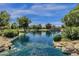 Scenic lake with lush landscaping and neighborhood views at 3829 E Sawtooth Dr, Chandler, AZ 85249