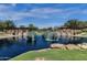 Serene pond with a central fountain and stonework at 3829 E Sawtooth Dr, Chandler, AZ 85249