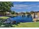 Relaxing pond with fountain and landscaping in a community at 3829 E Sawtooth Dr, Chandler, AZ 85249