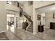 Grand entryway with a curved staircase and tile flooring at 3829 E Sawtooth Dr, Chandler, AZ 85249