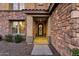 Elegant front door with decorative ironwork and stone accents at 3829 E Sawtooth Dr, Chandler, AZ 85249