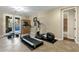 Home gym with treadmill, elliptical, and weights at 3829 E Sawtooth Dr, Chandler, AZ 85249