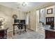 Home office featuring a standing desk and built-in cabinetry at 3829 E Sawtooth Dr, Chandler, AZ 85249