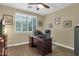 Home office with built-in desk and hardwood floors at 3829 E Sawtooth Dr, Chandler, AZ 85249