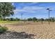 Sand volleyball court with net and surrounding park area at 3829 E Sawtooth Dr, Chandler, AZ 85249