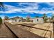 Large backyard with sand, a shed, and a horseshoe pit at 4033 N 14Th Pl, Phoenix, AZ 85014