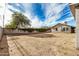 Large backyard with sand, a shed, and a horseshoe pit at 4033 N 14Th Pl, Phoenix, AZ 85014