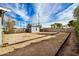 Large backyard with sand, a shed, and a horseshoe pit at 4033 N 14Th Pl, Phoenix, AZ 85014