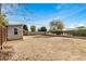 Large backyard with sand, a shed, and a horseshoe pit at 4033 N 14Th Pl, Phoenix, AZ 85014