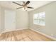 Bright bedroom with wood-look floors, ceiling fan and window at 4033 N 14Th Pl, Phoenix, AZ 85014