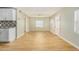 Open concept dining area with wood-look floors at 4033 N 14Th Pl, Phoenix, AZ 85014