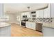 Updated kitchen featuring white cabinets and granite at 4033 N 14Th Pl, Phoenix, AZ 85014