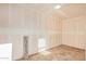 Unfinished room with drywall and cement flooring at 4033 N 14Th Pl, Phoenix, AZ 85014