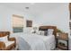 Relaxing bedroom with wicker chair and natural light at 4077 S Sabrina Dr # 24, Chandler, AZ 85248