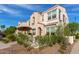 Two-story stucco home with patio, landscaping, and attractive curb appeal at 4077 S Sabrina Dr # 24, Chandler, AZ 85248