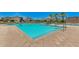 Community pool with spacious deck and lounge chairs at 4077 S Sabrina Dr # 24, Chandler, AZ 85248