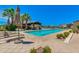 Resort-style pool with lounge chairs and patio umbrella at 4077 S Sabrina Dr # 24, Chandler, AZ 85248