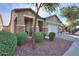 Front view of a charming house with well-manicured landscaping at 4129 E Cathy Dr, Gilbert, AZ 85296