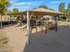 Community playground with shade structure and play equipment at 4129 E Cathy Dr, Gilbert, AZ 85296