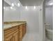 Bathroom with granite vanity and tiled flooring at 4200 N Miller Rd # 121, Scottsdale, AZ 85251