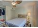 Bright bedroom with a double bed, ceiling fan, and closet at 4200 N Miller Rd # 121, Scottsdale, AZ 85251