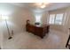 Home office with wood desk and view to window at 4200 N Miller Rd # 121, Scottsdale, AZ 85251