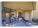 Small patio with seating area just outside the condo at 4200 N Miller Rd # 121, Scottsdale, AZ 85251