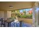 Private patio with table and chairs, offering an outdoor space for relaxing at 4200 N Miller Rd # 121, Scottsdale, AZ 85251