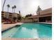 Inviting community pool with surrounding patio at 4200 N Miller Rd # 121, Scottsdale, AZ 85251