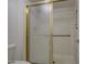 Clean shower with tiled walls and a glass door at 4200 N Miller Rd # 121, Scottsdale, AZ 85251