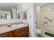 Clean bathroom, featuring a vanity, toilet and shower at 4444 E Paradise Village N Pkwy # 107, Phoenix, AZ 85032