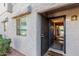 Inviting entryway with open door to interior at 4444 E Paradise Village N Pkwy # 107, Phoenix, AZ 85032