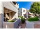 Exterior view of building showcasing landscaping and pathway at 4444 E Paradise Village N Pkwy # 107, Phoenix, AZ 85032