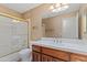 Bathroom boasts a vanity with wood cabinets and shower/tub combo at 4739 E Casey Ln, Cave Creek, AZ 85331