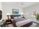 Guest bedroom with a queen-size bed and plantation shutters at 4739 E Casey Ln, Cave Creek, AZ 85331