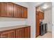 Laundry room with washer, dryer, and ample cabinetry at 4739 E Casey Ln, Cave Creek, AZ 85331