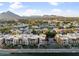 Aerial view of community near Camelback Mountain, showing the complex and surrounding area at 4803 N Woodmere Fairway -- # 2002, Scottsdale, AZ 85251