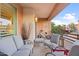 Relaxing balcony with seating and city views at 4803 N Woodmere Fairway -- # 2002, Scottsdale, AZ 85251