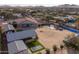 Aerial view of house, large backyard and detached garages at 510 E Desert Hills Estate Dr, Phoenix, AZ 85086