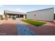 Relaxing backyard patio with seating area and brick pavers at 510 E Desert Hills Estate Dr, Phoenix, AZ 85086