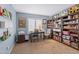 Cozy home office with built-in bookshelves and desk at 510 E Desert Hills Estate Dr, Phoenix, AZ 85086