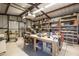 Large workshop with various tools and workbenches at 510 E Desert Hills Estate Dr, Phoenix, AZ 85086