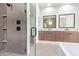 Elegant bathroom boasting double sinks and a frameless glass shower at 5740 E Moura Dr, Cave Creek, AZ 85331