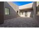 Modern paved courtyard featuring a private entrance to the home at 5740 E Moura Dr, Cave Creek, AZ 85331