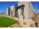 Stylish home exterior with desert landscaping and modern accents at 5740 E Moura Dr, Cave Creek, AZ 85331