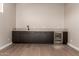 Modern bar area with sleek cabinetry and built-in wine cooler at 5748 E Moura Dr, Cave Creek, AZ 85331