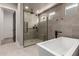 Spa-like bathroom with a large walk-in shower and a free-standing soaking tub at 5748 E Moura Dr, Cave Creek, AZ 85331