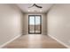 Bedroom with light floors and sliding glass door to patio at 5748 E Moura Dr, Cave Creek, AZ 85331