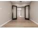 Hallway with dark wood doors leading to other rooms at 5748 E Moura Dr, Cave Creek, AZ 85331